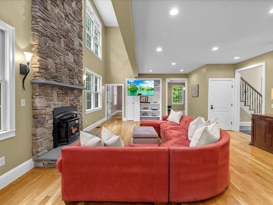 Fireplace, Interior, Living room, Recessed Lighting, Stone Walls, Wood Texture Flooring