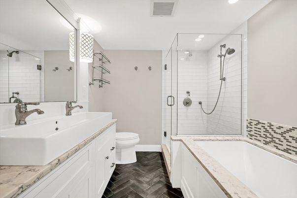 Bathroom, Dual Sink Vanities, Glass Shower, Interior, Recessed Lighting, Wood Texture Flooring