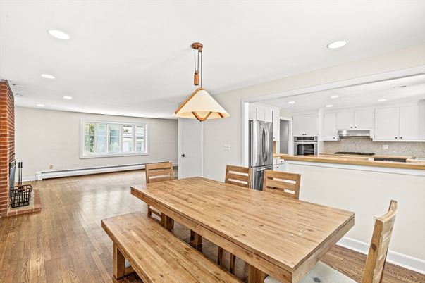 Dining room, Interior, Kitchen, Pendant Lights, Recessed Lighting, Stainless Steel Appliances, Wood Texture Flooring