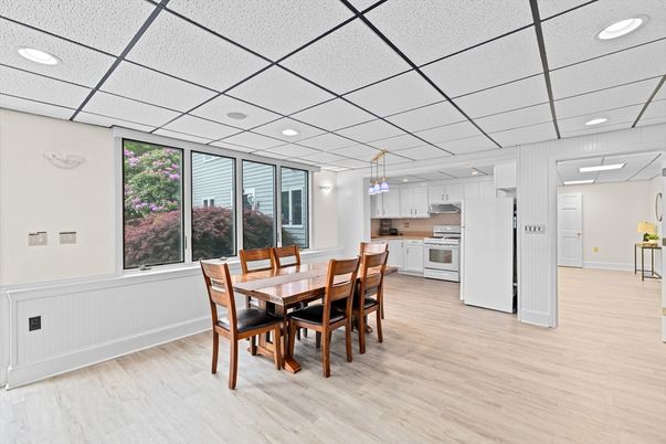 Dining room, Interior, Kitchen, Pendant Lights, Recessed Lighting, Stainless Steel Appliances, Wood Texture Flooring