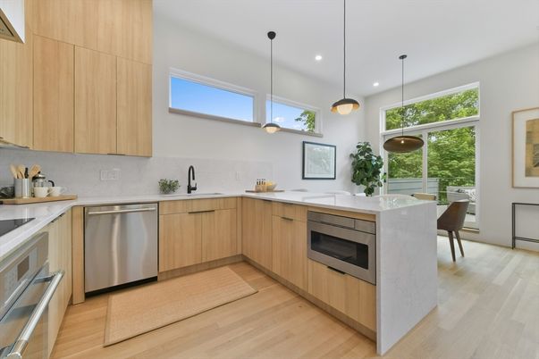Dining room, Interior, Kitchen, Pendant Lights, Recessed Lighting, Stainless Steel Appliances, Wood Texture Flooring
