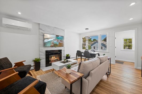 Dining room, Fireplace, Interior, Living room, Pendant Lights, Recessed Lighting, Wood Texture Flooring