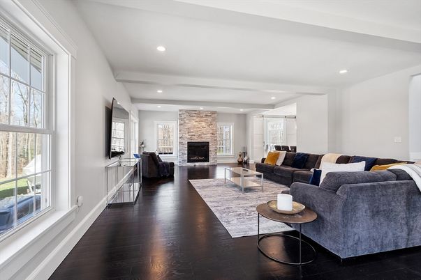 Fireplace, Interior, Living room, Recessed Lighting, Stone Walls, Wood Texture Flooring