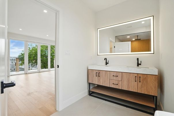 Bathroom, Dual Sink Vanities, Interior, Recessed Lighting, Wood Texture Flooring