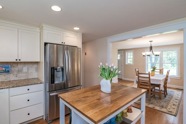 Chandelier, Dining room, Interior, Kitchen, Recessed Lighting, Stainless Steel Appliances, Wood Texture Flooring