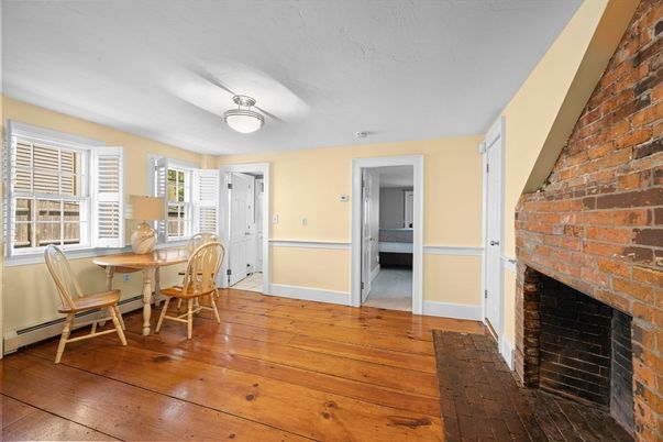 Dining room, Fireplace, Interior, Stone Walls, Wood Texture Flooring