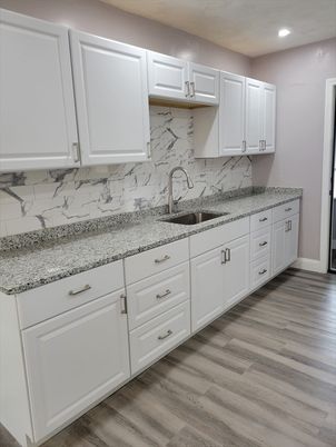 Interior, Kitchen, Marble Walls, Recessed Lighting, Wood Texture Flooring