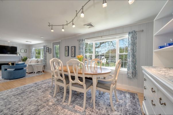 Dining room, Fireplace, Interior, Living room, Recessed Lighting, Wood Texture Flooring