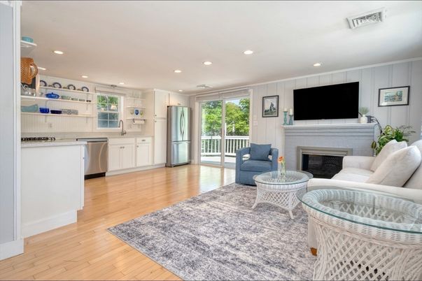 Fireplace, Interior, Kitchen, Living room, Recessed Lighting, Stainless Steel Appliances, Wood Texture Flooring