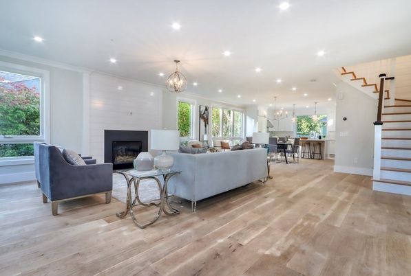 Chandelier, Dining room, Fireplace, Interior, Living room, Pendant Lights, Recessed Lighting, Wood Texture Flooring