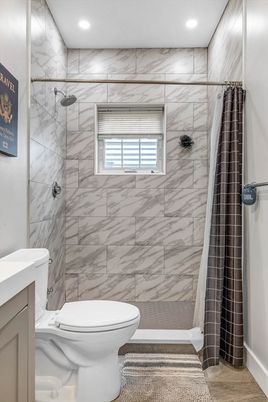 Bathroom, Interior, Marble Walls, Recessed Lighting, Wood Texture Flooring