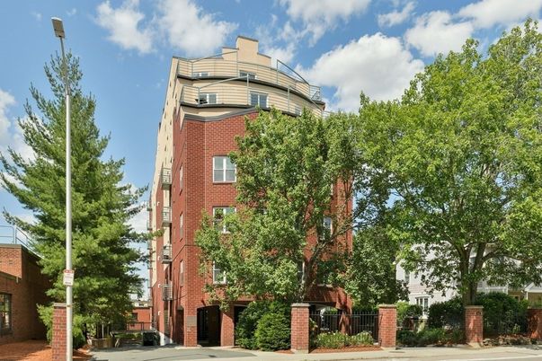 Exterior, Facade, Brick Facade, Condo Building