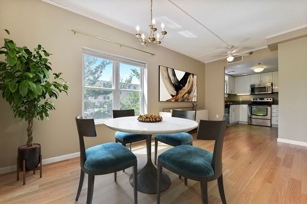 Chandelier, Dining room, Interior, Kitchen, Stainless Steel Appliances, Wood Texture Flooring