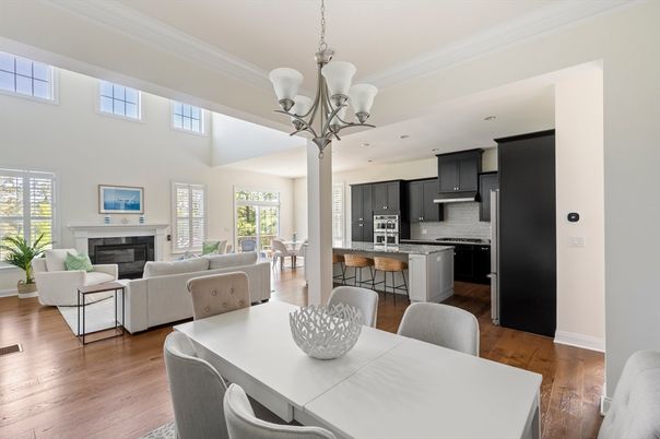 Chandelier, Dining room, Fireplace, Interior, Kitchen, Living room, Stainless Steel Appliances, Wood Texture Flooring