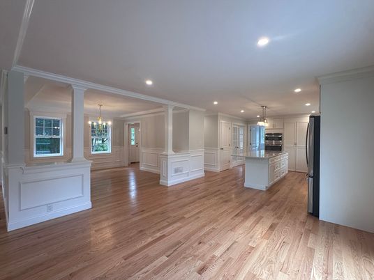 Chandelier, Empty room, Interior, Kitchen, Recessed Lighting, Stainless Steel Appliances, Wood Texture Flooring
