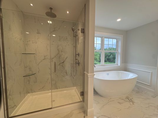 Bathroom, Free Standing Baths, Glass Shower, Interior, Marble, Marble Walls, Recessed Lighting