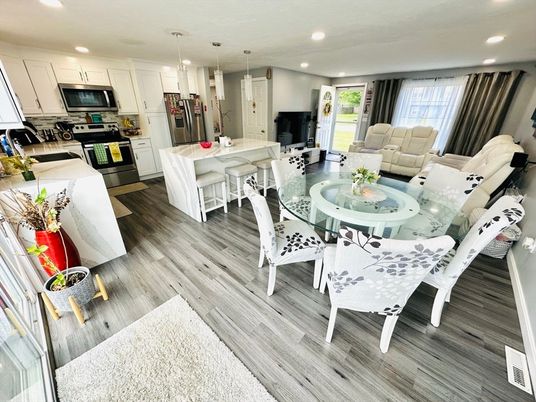 Dining room, Interior, Kitchen, Living room, Pendant Lights, Recessed Lighting, Stainless Steel Appliances, Wood Texture Flooring