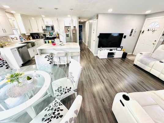 Dining room, Interior, Kitchen, Living room, Pendant Lights, Recessed Lighting, Stainless Steel Appliances, Wood Texture Flooring