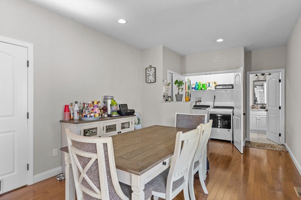 Dining room, Interior, Kitchen, Recessed Lighting, Stainless Steel Appliances, Wood Texture Flooring