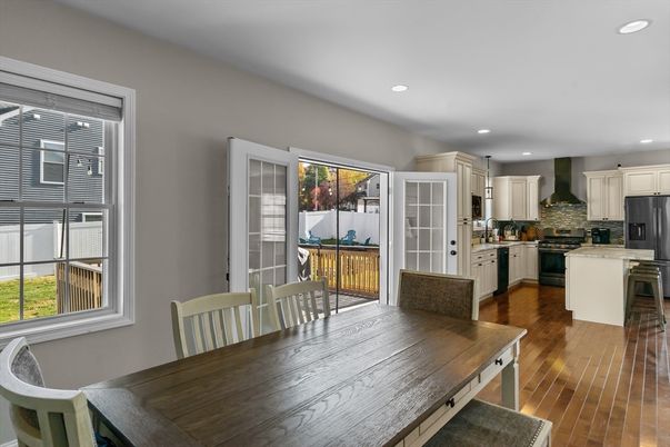 Dining room, Interior, Kitchen, Recessed Lighting, Stainless Steel Appliances, Wood Texture Flooring