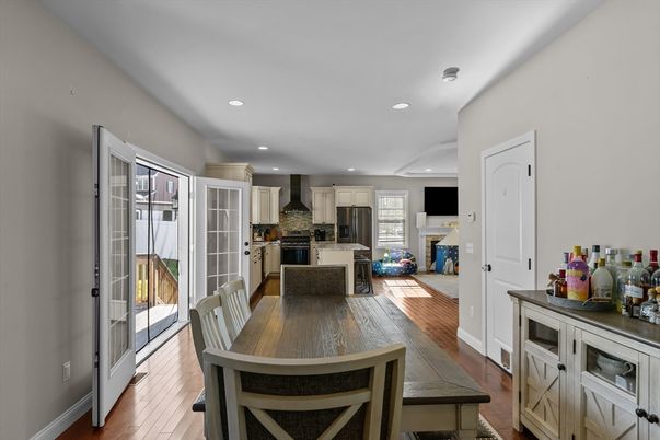 Dining room, Interior, Kitchen, Recessed Lighting, Stainless Steel Appliances, Wood Texture Flooring