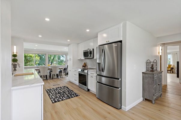 Dining room, Interior, Kitchen, Recessed Lighting, Stainless Steel Appliances, Wood Texture Flooring