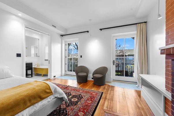 Bedroom, Fireplace, Interior, Recessed Lighting, Stone Walls, Wood Texture Flooring