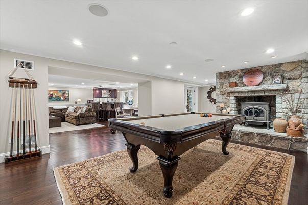 Billiard Table, Fireplace, Game Room, Interior, Recessed Lighting, Stone Walls, Wood Texture Flooring