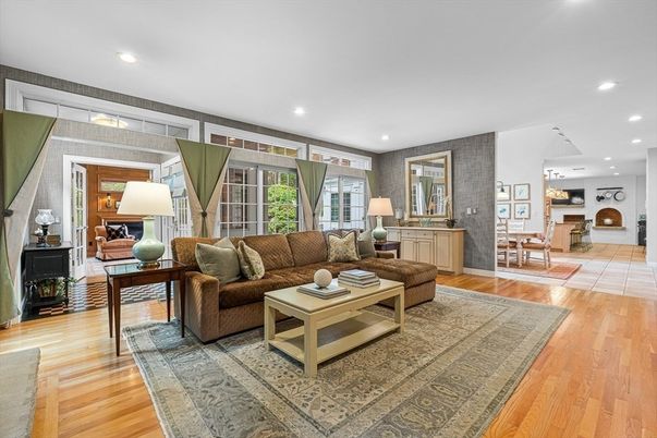 Dining room, Fireplace, Interior, Living room, Pendant Lights, Recessed Lighting, Wood Texture Flooring