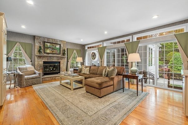Fireplace, Interior, Living room, Recessed Lighting, Stone Walls, Wood Texture Flooring