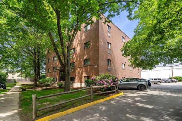 Exterior, Facade, Brick Facade, Condo Building