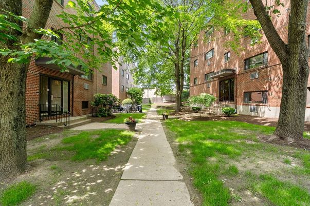 Backyard, Exterior, Facade, Brick Facade, Condo Building