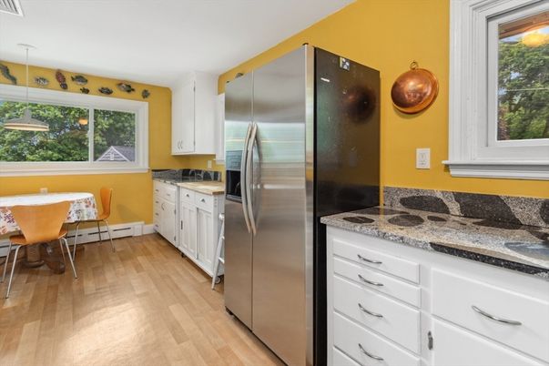 Dining room, Interior, Kitchen, Pendant Lights, Stainless Steel Appliances, Wood Texture Flooring