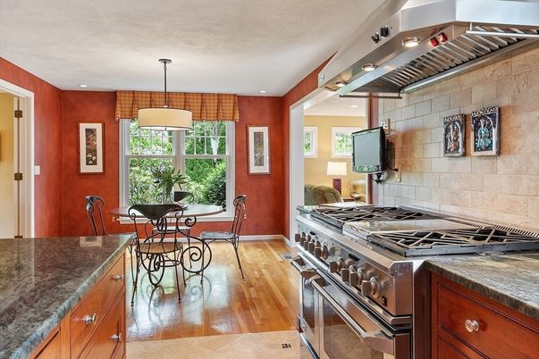 Dining room, Interior, Kitchen, Pendant Lights, Recessed Lighting, Stainless Steel Appliances, Stone Walls, Wood Texture Flooring
