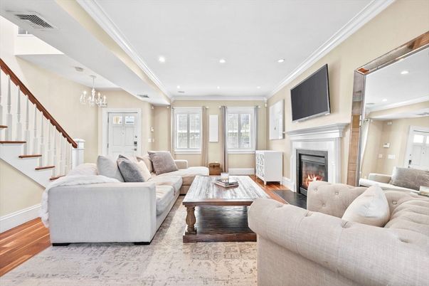 Chandelier, Fireplace, Interior, Living room, Recessed Lighting, Wood Texture Flooring