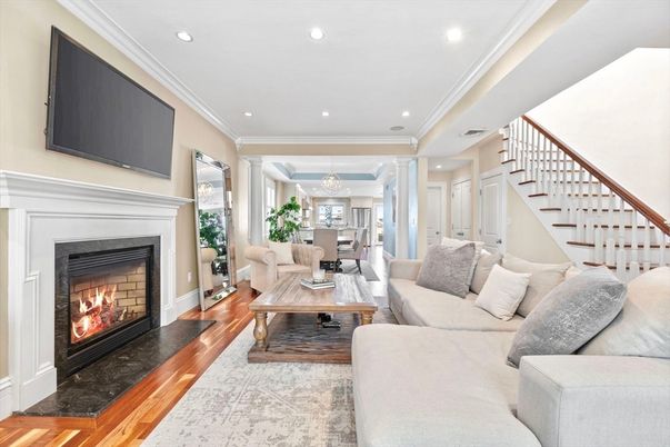 Chandelier, Dining room, Fireplace, Interior, Living room, Recessed Lighting, Wood Texture Flooring