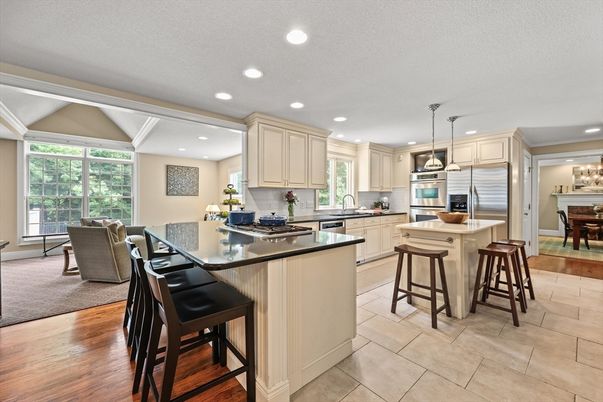Dining room, Interior, Kitchen, Pendant Lights, Recessed Lighting, Stainless Steel Appliances, Wood Texture Flooring
