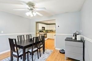 Dining room, Interior, Kitchen, Recessed Lighting, Stainless Steel Appliances, Wood Texture Flooring
