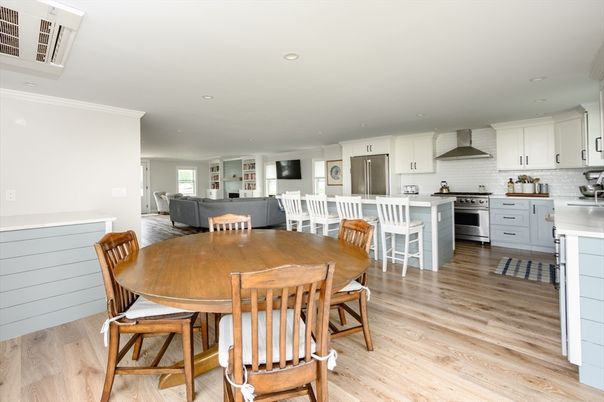 Dining room, Interior, Kitchen, Living room, Recessed Lighting, Stainless Steel Appliances, Wood Texture Flooring