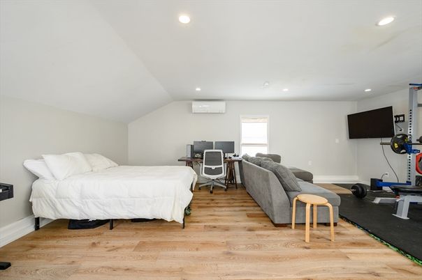 Bedroom, Fitness Equipment, Interior, Recessed Lighting, Wood Texture Flooring
