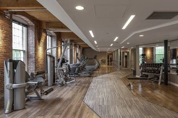 Fitness Equipment, Gym, Interior, Recessed Lighting, Stone Walls, Wood Texture Flooring