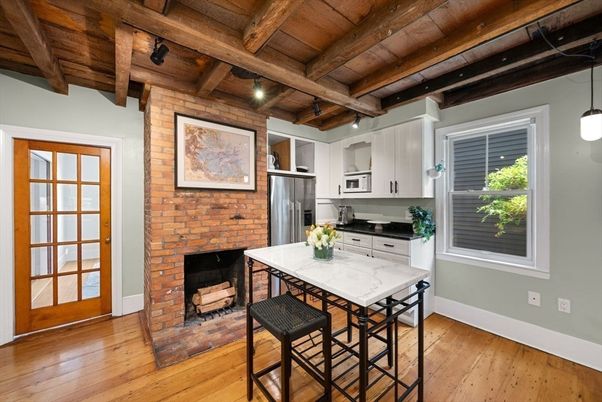 Fireplace, Interior, Kitchen, Pendant Lights, Stainless Steel Appliances, Stone Walls, Wooden Beams, Wooden Ceilings, Wood Texture Flooring