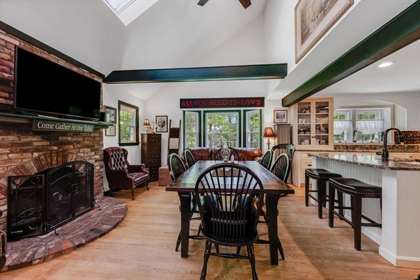 Dining room, Fireplace, Interior, Recessed Lighting, Stone Walls, Wooden Beams, Wood Texture Flooring