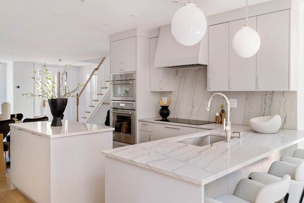 Interior, Kitchen, Marble Walls, Pendant Lights, Recessed Lighting, Stainless Steel Appliances, Wood Texture Flooring