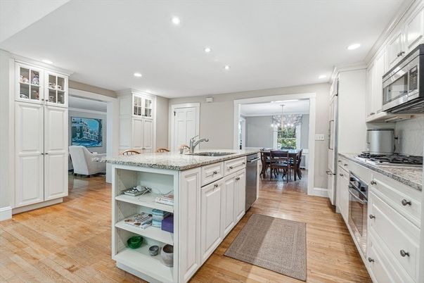 Chandelier, Dining room, Interior, Kitchen, Recessed Lighting, Stainless Steel Appliances, Wood Texture Flooring