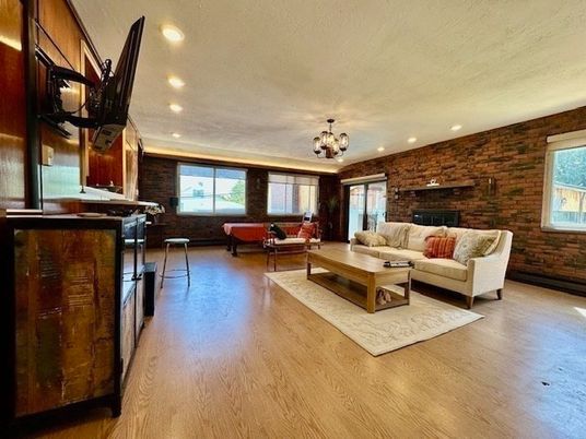 Interior, Living room, Recessed Lighting, Stone Walls, Wood Texture Flooring