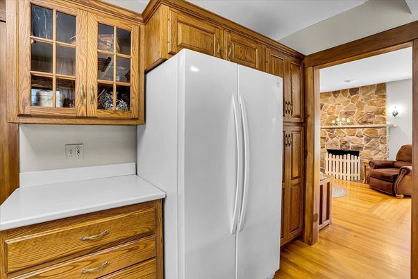 Fireplace, Interior, Kitchen, Stone Walls, Washer, Wood Texture Flooring