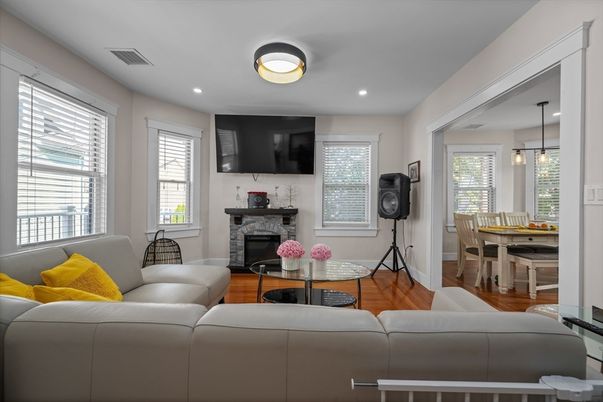 Dining room, Fireplace, Interior, Living room, Pendant Lights, Recessed Lighting, Wood Texture Flooring