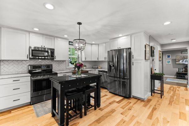 Chandelier, Interior, Kitchen, Pendant Lights, Recessed Lighting, Stainless Steel Appliances, Wood Texture Flooring