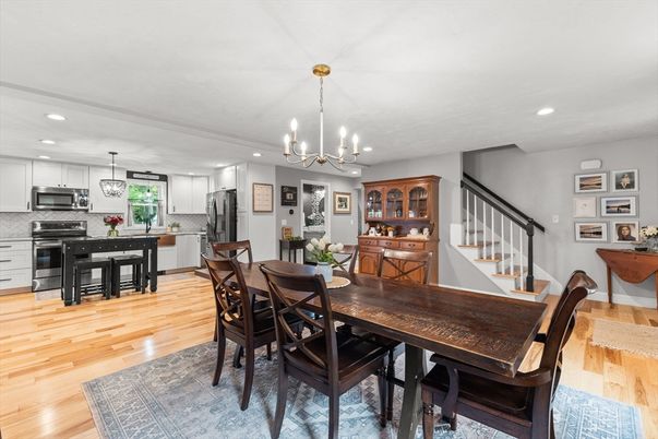 Chandelier, Dining room, Interior, Kitchen, Pendant Lights, Recessed Lighting, Stainless Steel Appliances, Wood Texture Flooring
